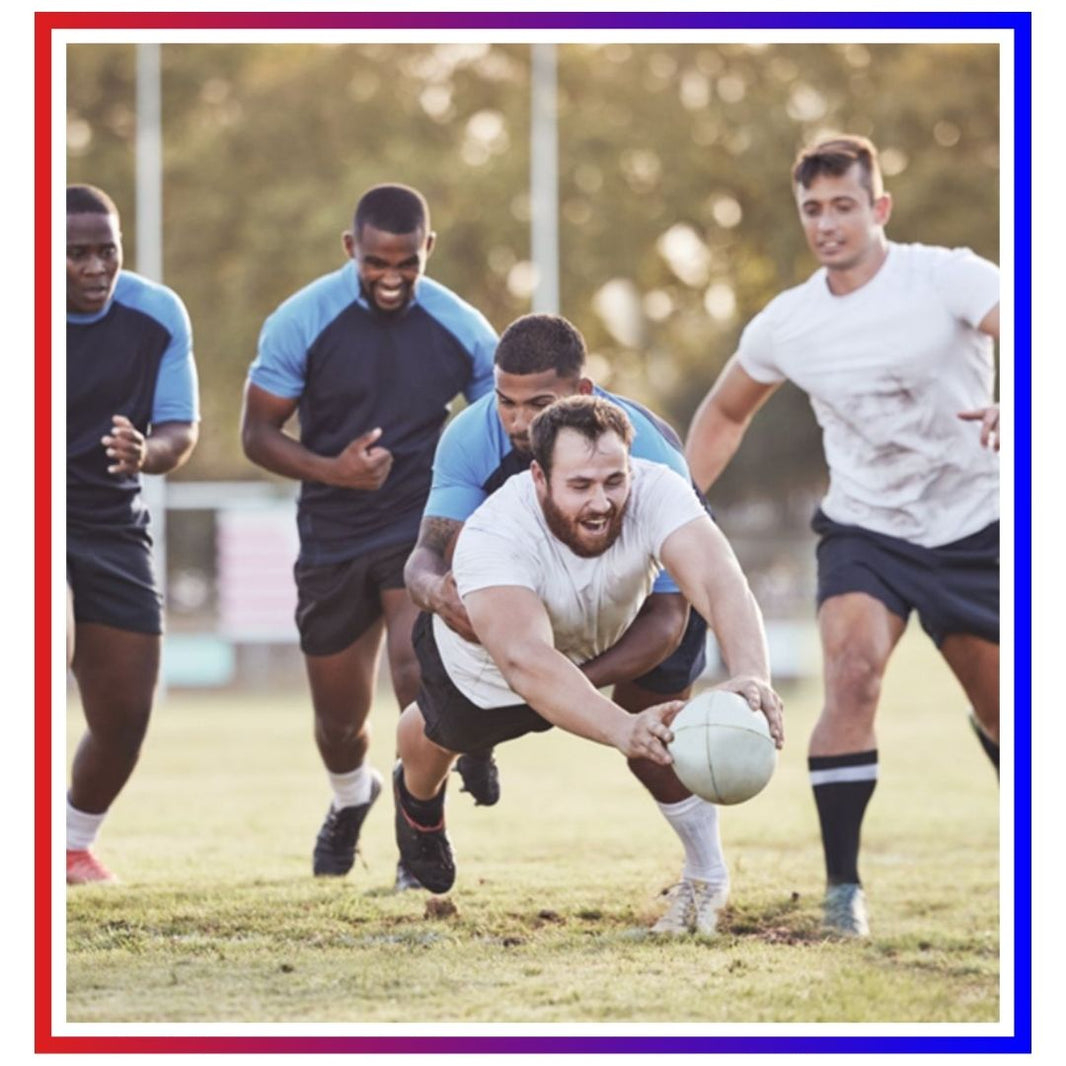 Rugby players competing for ball during match